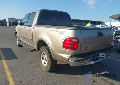 2001 Ford F150 Supercrew z USA, uszkodzony, nr VIN 1FTRW08L41KF96837